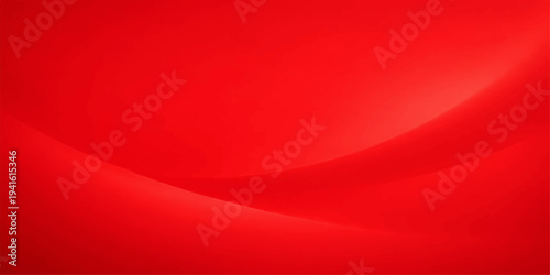 Red silk satin fabric background with flowing texture
