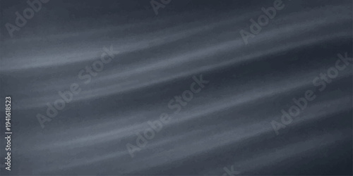 Luxurious black silk and satin fabric background featuring smooth flowing waves and soft dark curves for an elegant textile wallpaper design