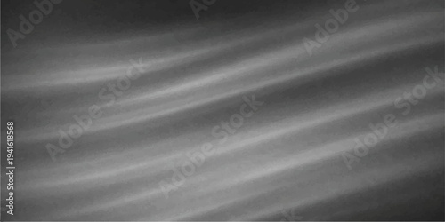 Smooth black satin fabric creates a dark wave pattern with a shiny brushed metallic texture resembling silk or gray aluminum on a sleek steel surface