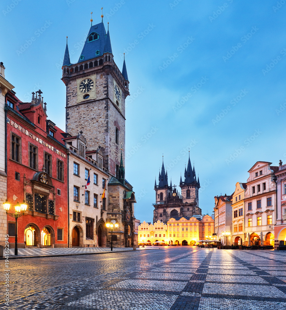 Fototapeta premium Prague Old Town square illuminated at sunrise, Czech Republic