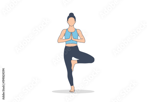 Woman practicing yoga in tree pose for balance and mindfulness.