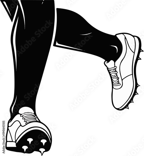 Close-up of a runner's legs and spiked track shoes in motion