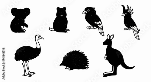 Diverse collection of black and white animal silhouettes, including mammals and birds