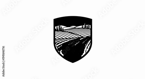 Black and white crest featuring rolling hills and agricultural fields