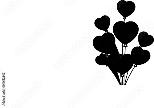 Black heart-shaped balloons float together in a cluster
