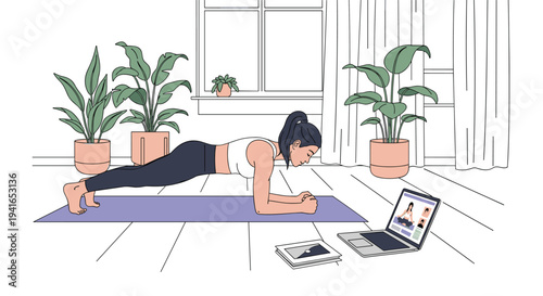 Focused young woman performs a plank exercise on a yoga mat while following an online workout tutorial on her laptop.