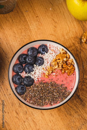 a plate of smoothies with blueberries and chia seeds