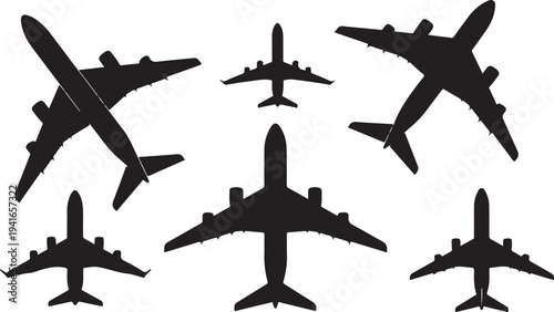 Collection of airplane silhouettes in various flight positions