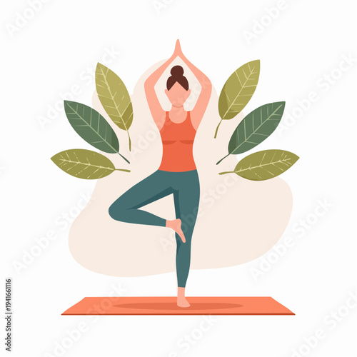 Woman practicing yoga tree pose with green leaves and soft background