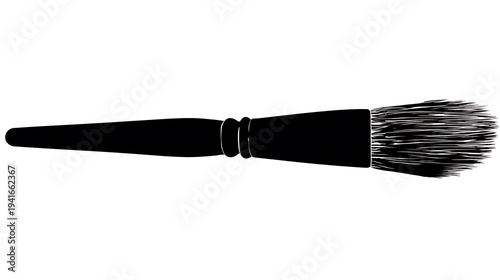 A paintbrush with a black handle and bristles