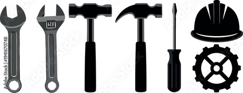 Collection of industrial tools including wrenches, hammers, screwdriver, hard hat and gear for construction and repair
