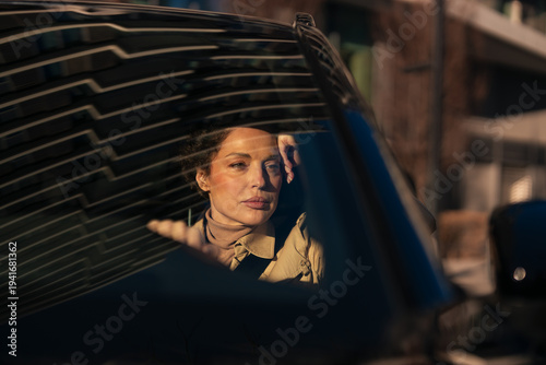 Tableau sur toile Woman traveling in car reflecting thoughtful moment