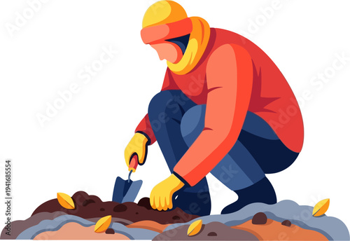 Gardener digging in soil with trowel during autumn