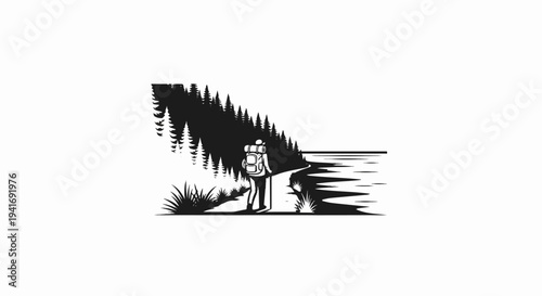 Lone hiker walks a winding path beside a forest and a shimmering body of water