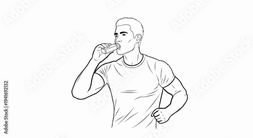 Man in t-shirt drinks from a small rectangular container