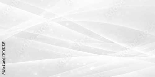 Abstract white background with elegant lines featuring a cold winter texture of frozen ice crystals and macro frost patterns on a light blue surface