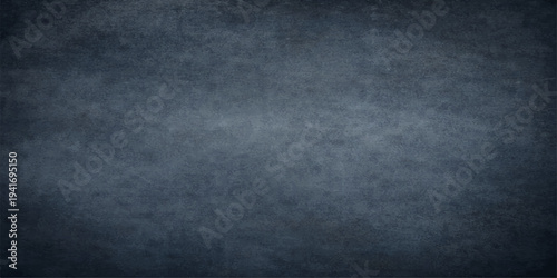 A dark blue grunge background features a vintage textured wall pattern with a rough, dirty surface that creates an empty old blackboard backdrop for a blank design