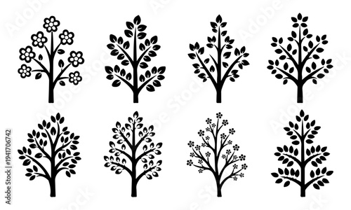 Set of eight black tree silhouettes with leaves and flowers