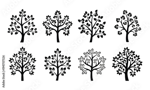 Set of Stylized Black Tree Silhouettes on White Background