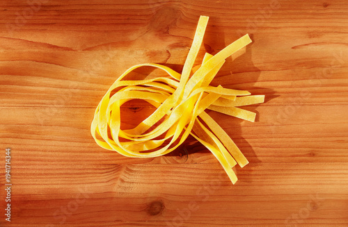 Dried tagliatelle pasta studio shot