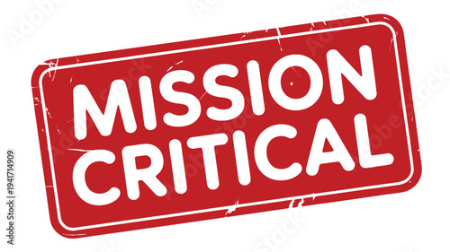 Red rubber stamp displaying the words mission critical in white
