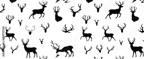 Black deer and reindeer silhouette pattern with various stag head and antler elements isolated on white background for winter holiday design.