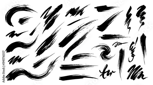 Abstract black brush strokes on a white background, showcasing artistic movement and texture