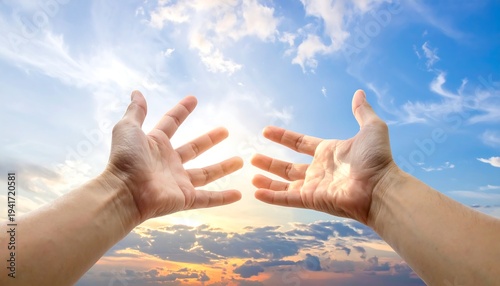 Reaching hands towards bright sky, clouds & sunset glow