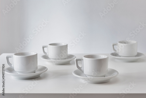 White cups on table