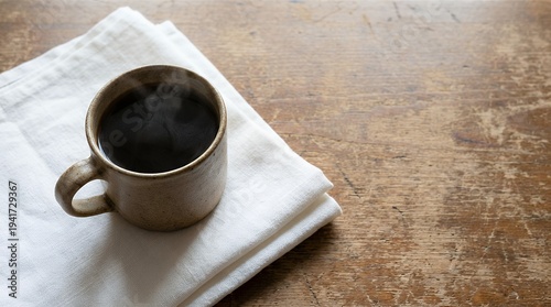 Steaming coffee cup on rustic table with gentle steam motion, slow camera pan, ambient light flicker, and minimalist style perfect for cozy kitchen or caf? ambiance videos.