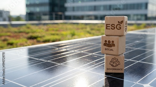 Static close-up of stacked wooden cubes labeled ESG with engraved environmental and governance icons placed on a reflective solar panel surface, subtle natural daylight glint across the panel grid, sl