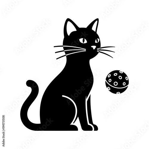 A black cat sitting next to a ball