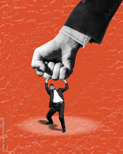 Cuadro en lienzo Surreal collage showing a giant hand squeezing a tiny businessman