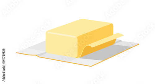 A block of butter on a piece of paper.