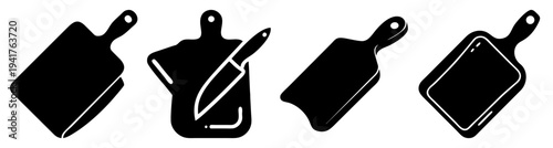 Set of four black kitchen spatulas isolated on white background for cooking utensils and baking tools collection