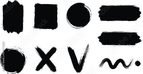 A collection of black brushstroke letters and symbols on a white background