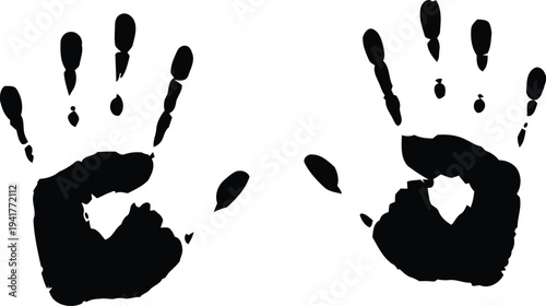 A pair of black handprints on a white background