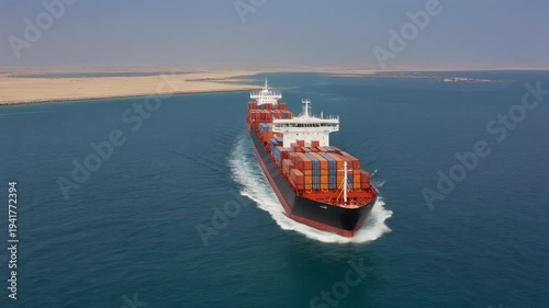 Cargo Ship with Shipping Containers in Canal
