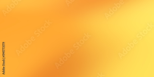 Vibrant abstract yellow orange blur background. Soft focus gradient of warm colors, smooth and colorful backdrop
