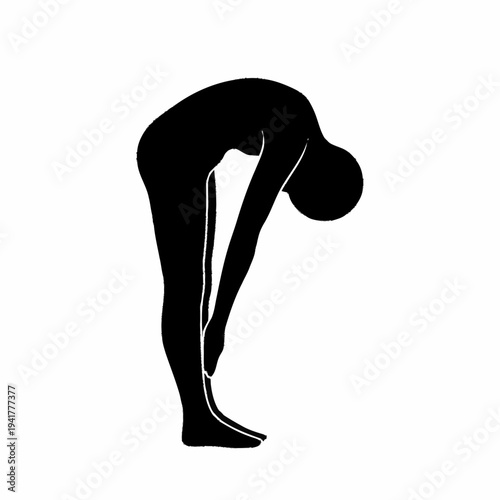 Silhouette of a person performing a forward bend yoga pose.