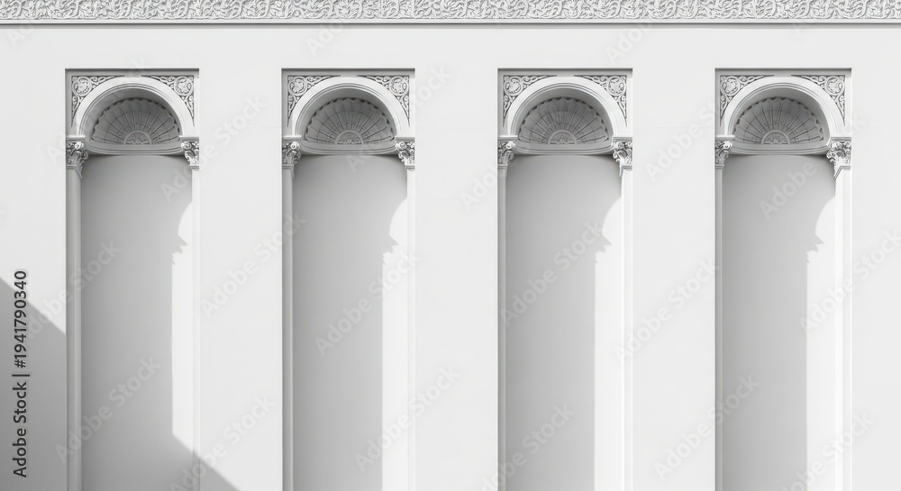Fototapeta premium Close up of four white columns with ornate arches