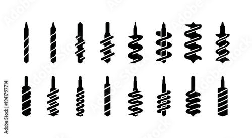 Collection of various black spiral and striped mascara wands on a clean surface, viewed directly from above
