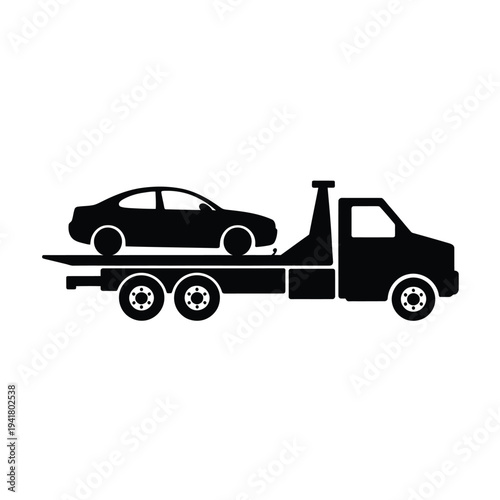 A black silhouette of a car being transported on a tow truck platform