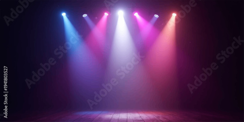 An illuminated blue spotlight shines through a dark, smoke-filled theater stage during a night concert event, creating a dramatic lighting design for the music show