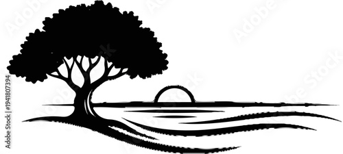 Silhouette of a lone tree by a tranquil ocean at sunset