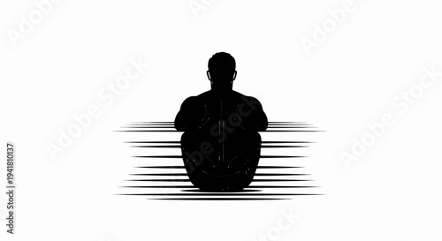 Silhouette of a person sitting with back to viewer, lines behind