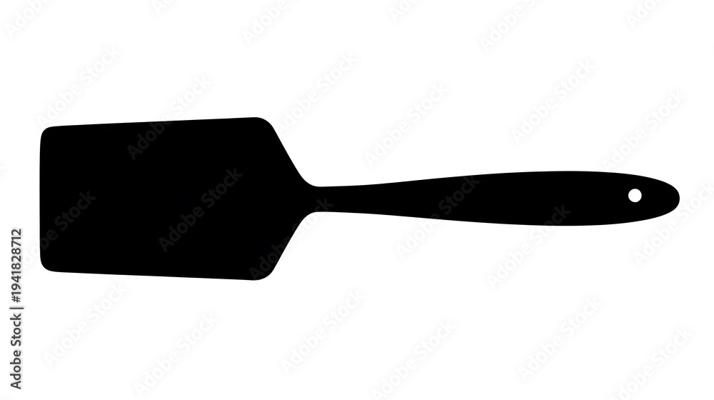 Obraz premium A silhouette of a spatula, essential tool in the kitchen