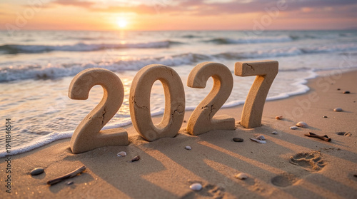 2027 New Year beach scene with sand numbers