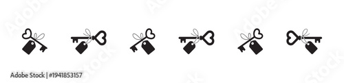 Set of five heart shaped bow keys with gift tags presented as a decorative divider line