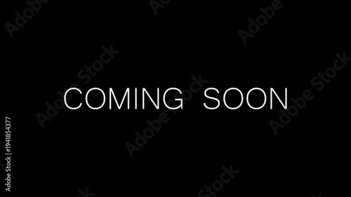 Coming soon text animation with blur reveal and chromatic aberration glow effect. Modern cinematic teaser title with alpha channel on black background.